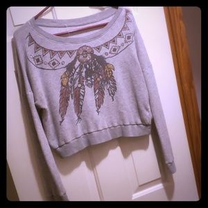 Long sleeved, crop top